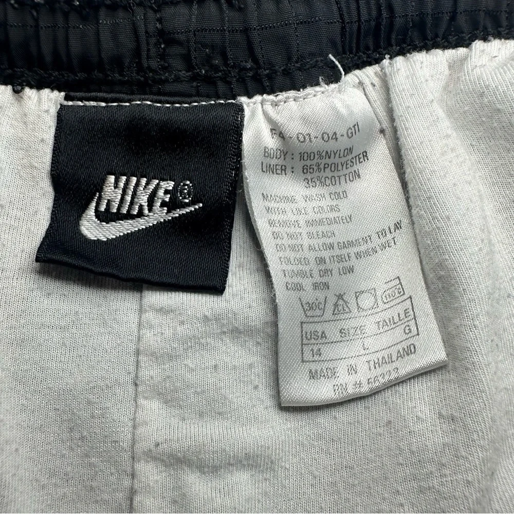 Vintage 1990s Black Tag Nike Challenge Court Track Pants. Black. Size: Large.